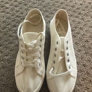 Platform tennis shoes. Worn twice.